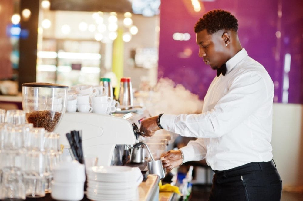 african-american-bartender-barista-bar-preparing-coffee